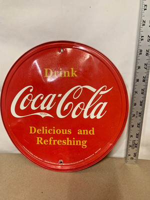 Coca-Cola Round Tin Sign with Dents and Screw Holes 11.5 Inches