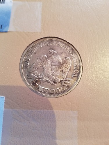 1858 seated liberty half dollar TONED ????
