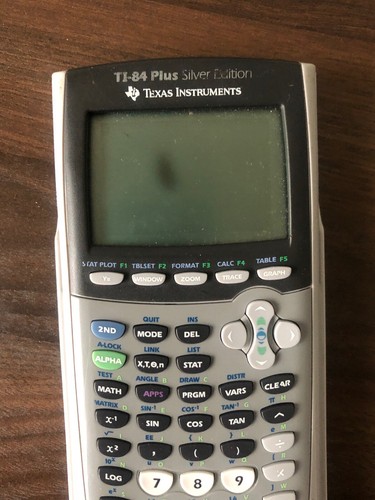 Texas Instruments TI-84 Plus Silver Edition Graphing Calculator - W/ Batteries