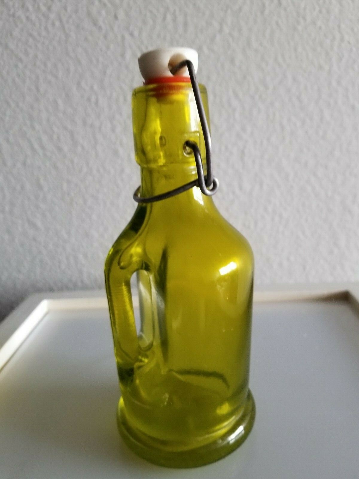 Antique Green Bottle with Handle & Ceramic Top 6 1/2