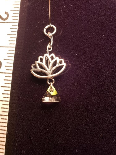 Belly button rings dangle