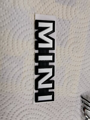 Austin Mini Van Clubman Cooper badge rear ''MINI'' Schriftzug Logo PAM2429 NOS