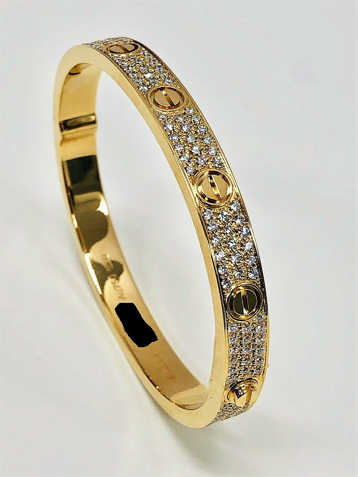 Cartier Love Bracelet, 18K Yellow Gold Set With 204 Brilliant cut Diamonds.