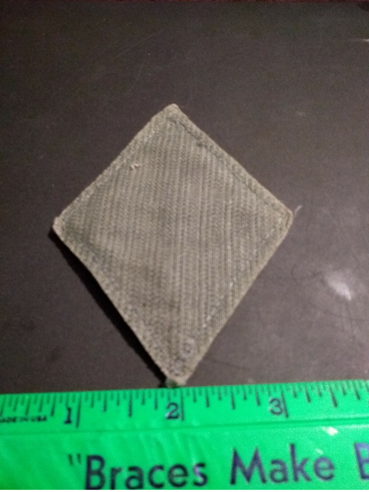 USMC 1ST MARINE DIVISION SUBDUED UNIFORM SHOULDER PATCH- Hook and loop Back.