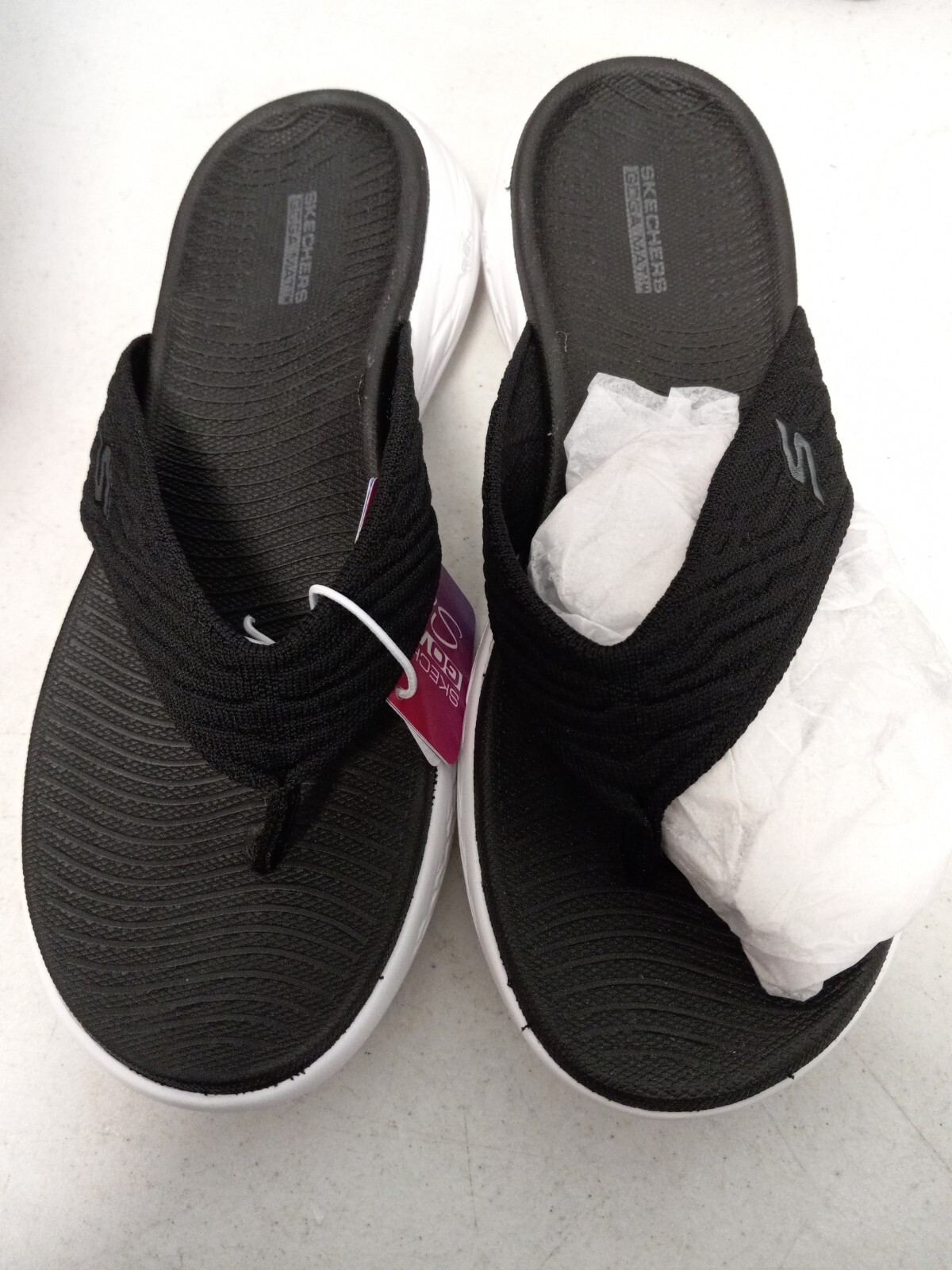 women sketchers flip flops