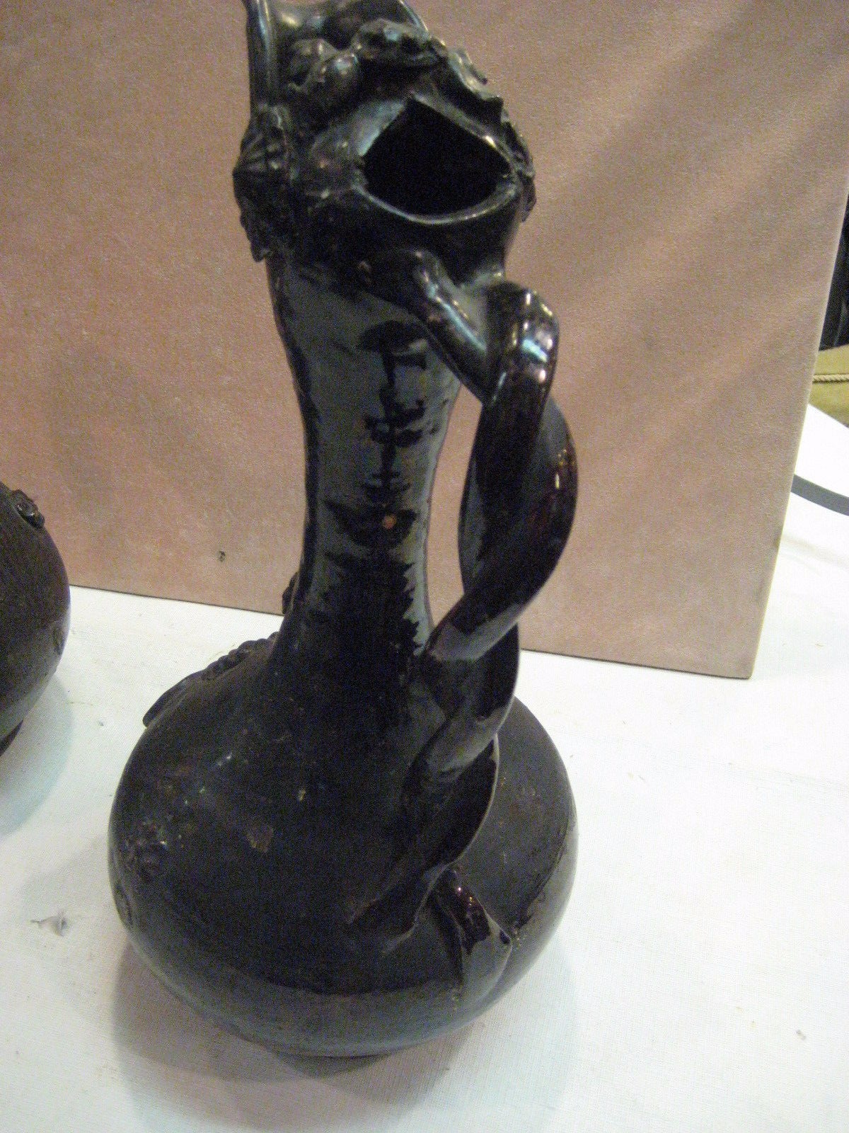 RARE ASIAN PAIR OF POTTERY EWERS