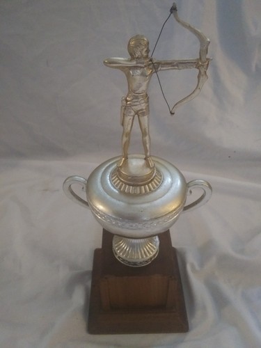 Collection of 11 vintage womens archery trophies