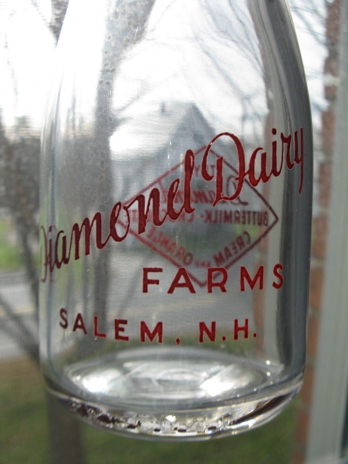 Vintage milk bottle Diamond Dairy Farms Salem, N.H. RD pyro