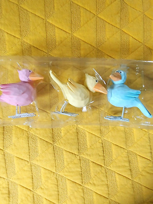 Whimsical 3 piece tablet top set of colorful birds. Made of resin and wire.