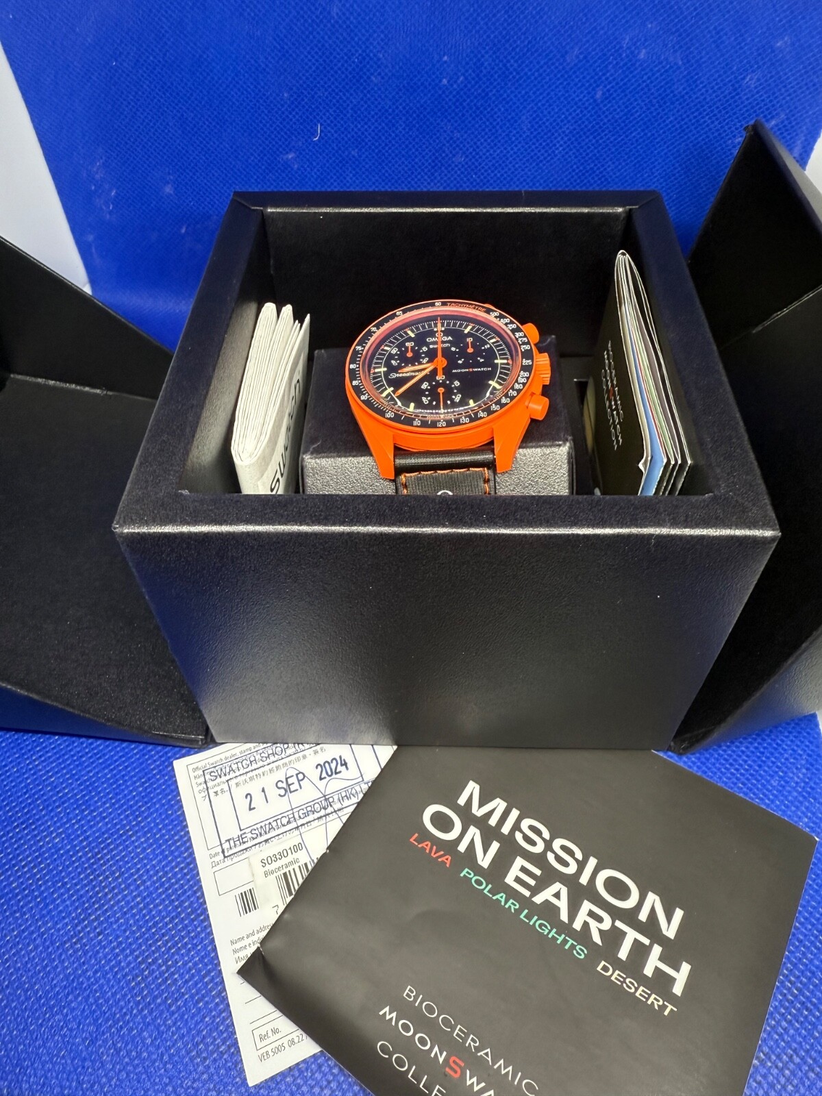 Omega x Swatch Mission On Earth Lava MoonSwatch Box With Wty Omega x Swatch Mission On Earth Lava MoonSwatch Box With Wty