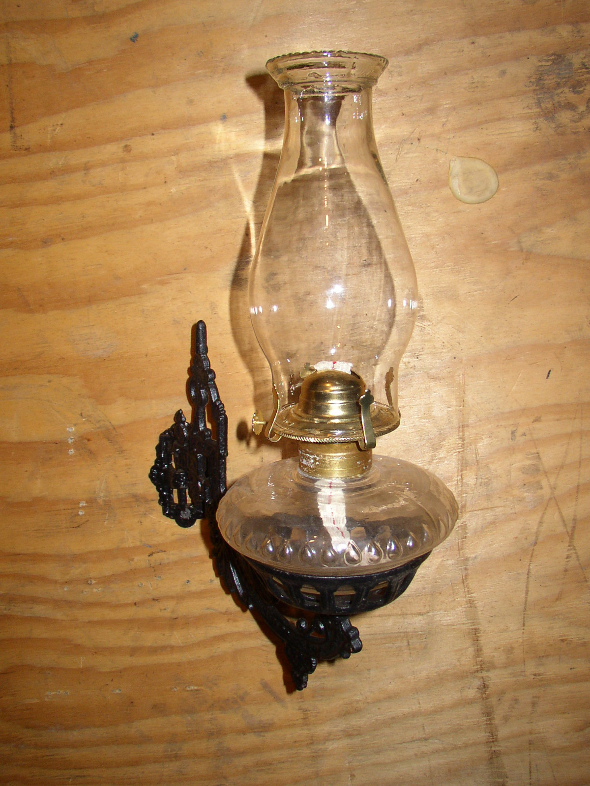Cast iron wall mount holder (sconce) with oil lamp