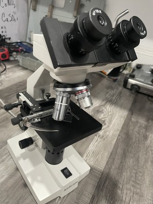 AmScope B100C 40X-2500X Microscope w/ 8 Objective lenses included (4 Oil/ 4 Apo)