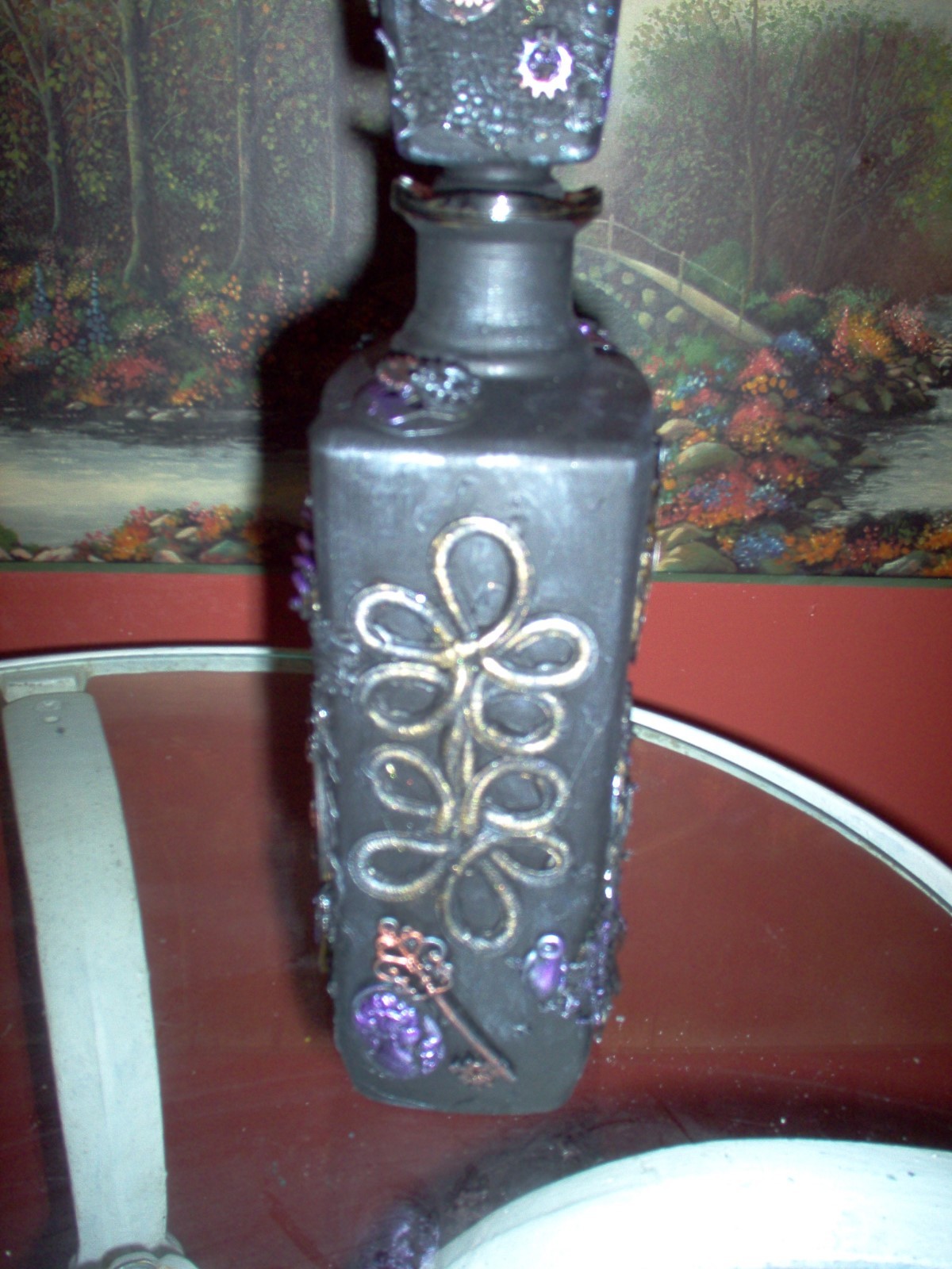 steampunk/altered art decanter, black, metallic highlights. 11