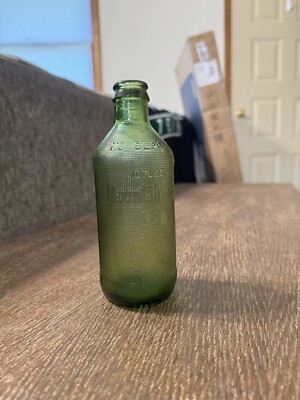Vintage  Embossed Mountain Dew Bottle. It Will Tickle Your Innards.