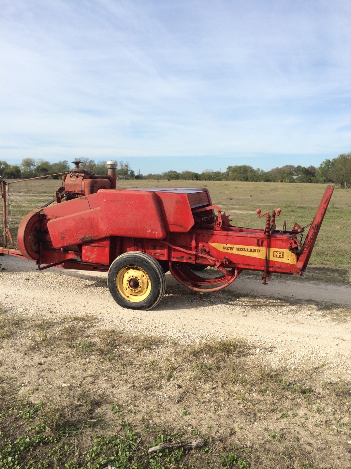 New Holland square baler. One owner. Engine powered.