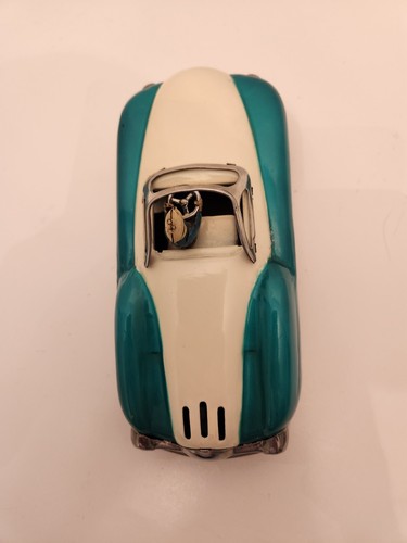 Vintage tin friction toy car by Alps, Japan