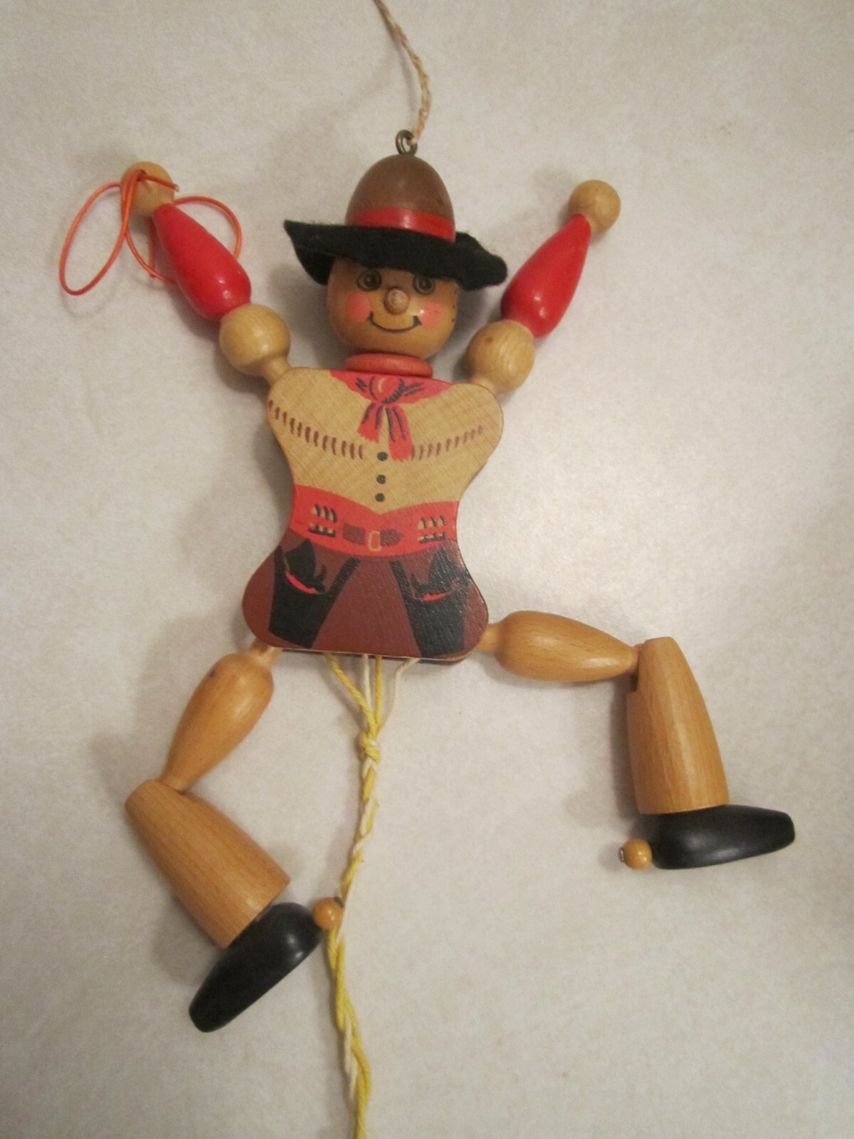 vintage wooden cowboy jumping-jack (marionette) puppet