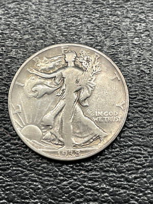 1938-D WALKING LIBERTY HAF DOLLAR IN GOOD CONDITION. CLEANED. FREE SHIPPNG.