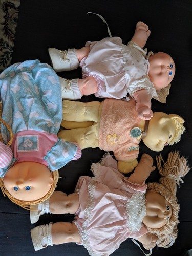 Cabbage Patch Kids. Lot Of 4 Includes Koosa W Orange Sweater