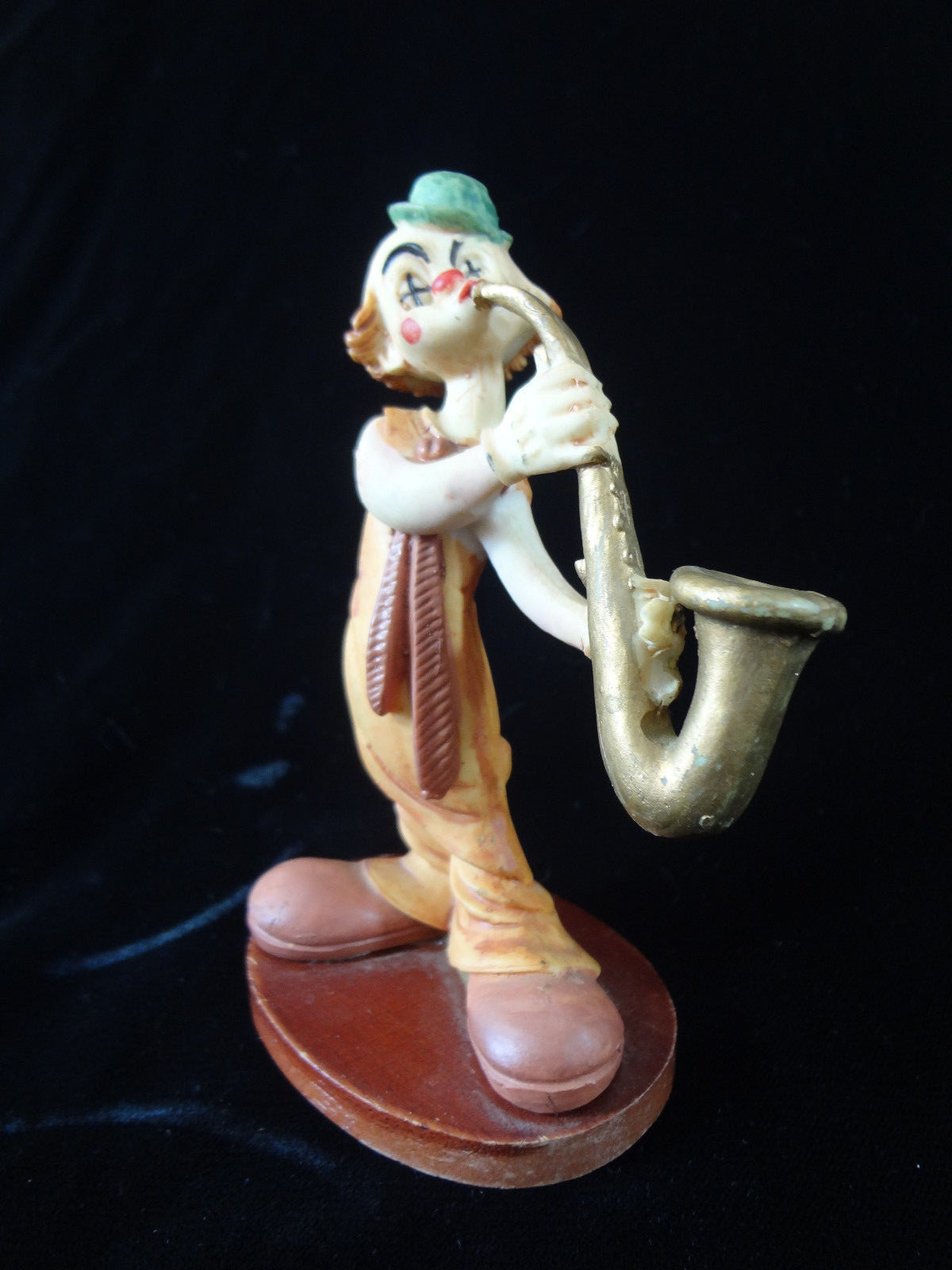 Vintage Man Clown Figurine - Music -  Blowing the Saxaphone Horn - Wood Stand