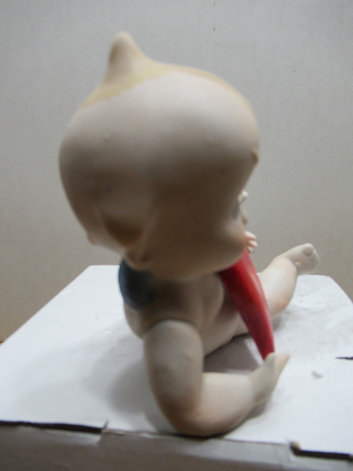 Kewpie Valentine Cupid Porcelain Figurine with a Leaning Pose