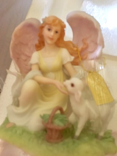 Ceramic Figurine...new in Box....so Detailed