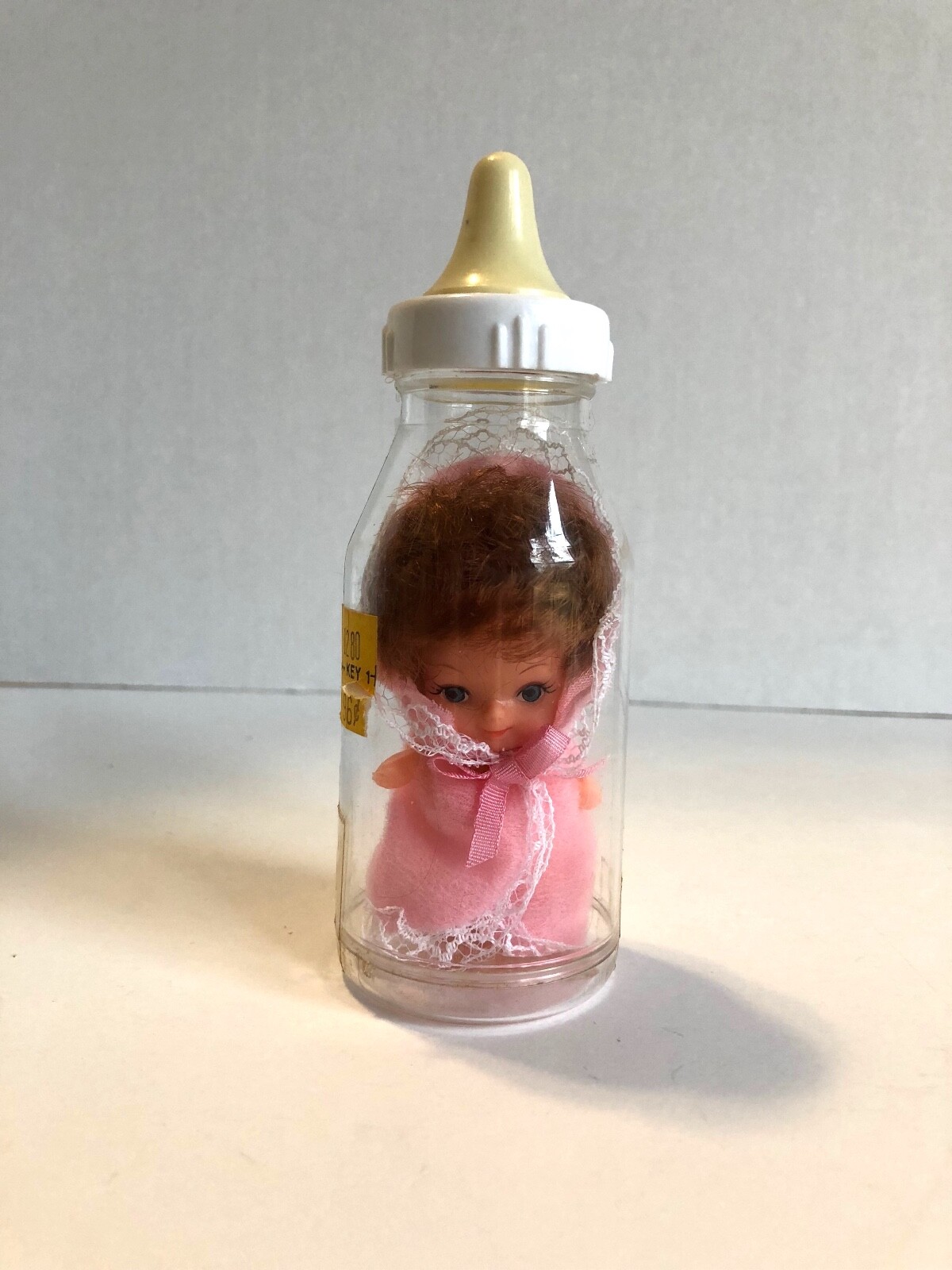 Baby Doll in Plastic Bottle 3 Inches Vintage