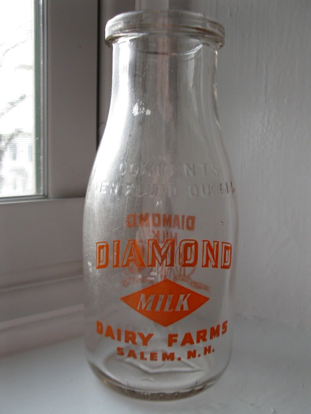 Vintage milk bottle Diamond Dairy Farms Salem, N.H. RD pyro orange 10 ounces