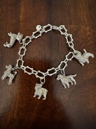 Spectacular Sterling Silver Tiffany & Co. Dog Charm Bracelet Spectacular Sterling Silver Tiffany & Co. Dog Charm Bracelet