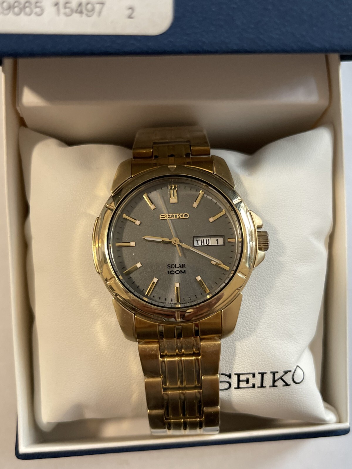 Seiko Mens Watch SNE100 Solar Gold Tone Stainless Steel Grey Dial Day Date 39mm
