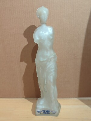 Aphrodite of Melos ,Venus de Milo, Ouzo appetizer empty glass bottle 