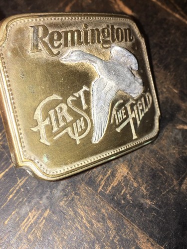 VINTAGE REMINGTON BELT BUCKLE - FIRST IN THE FIELD