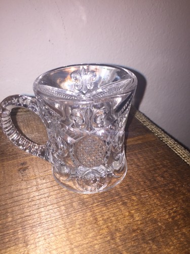 Bryce Higbee Arched Fleur De Lis Handled Mug Clear EAPG Circa early 1900's