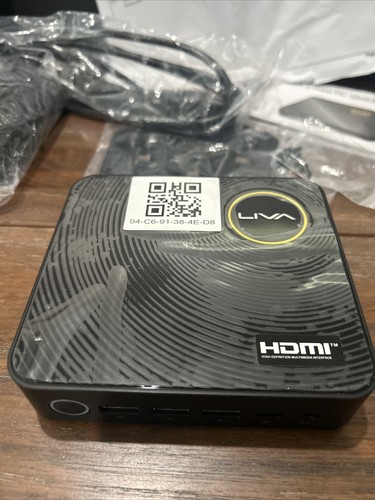 Liva Z mini PC for Aruze Games. In box with Power supply and