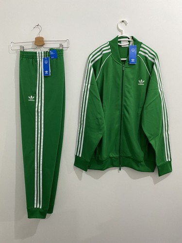 blue and green adidas tracksuit
