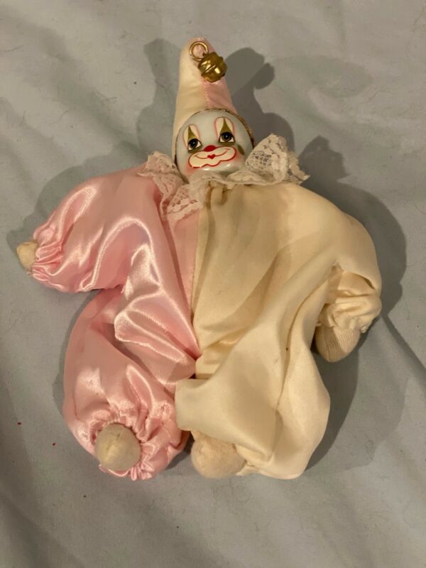 Decorative pink and white bean bag clown figurine