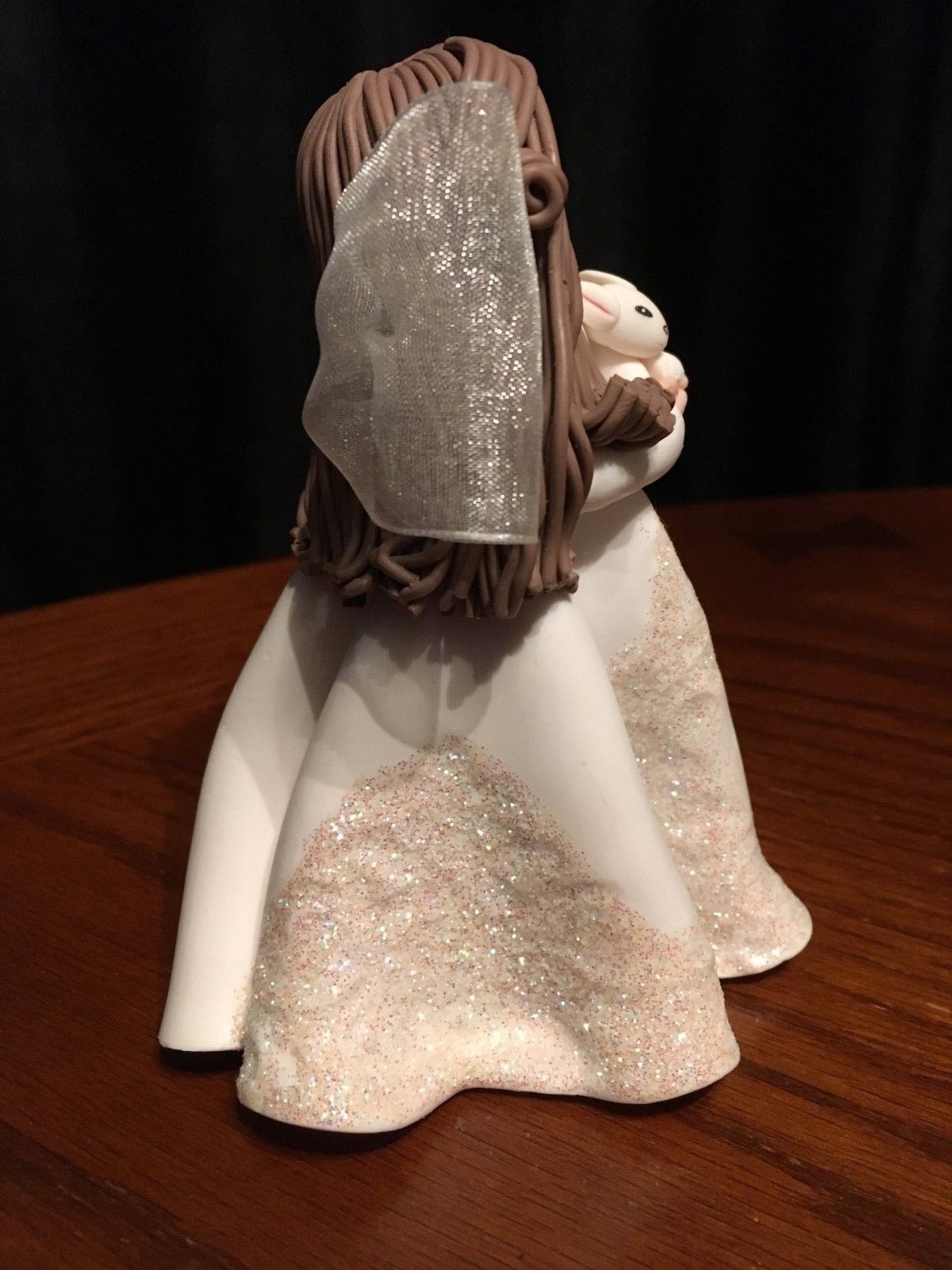 Girl in Sparkling Dress with bow holding Bunny 5