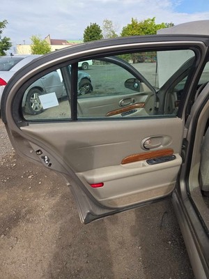 Used Left Rear Door Trim Panel fits: BUICK LESABRE Left 00 01 02 03