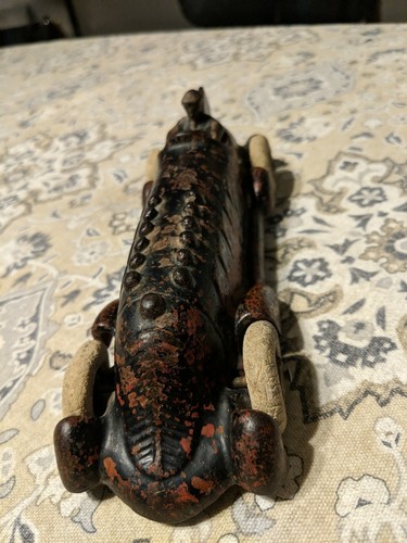 A. C. Williams Cast Iron Boat Tail Racer w/ Driver Embossed Pistons 8.5