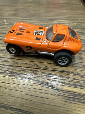AURORA T-JET  ORIGINAL TUFF ONES ORANGE Chevrolet CHEETAH #2 HO SLOT CAR