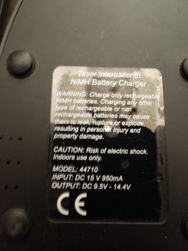 TASER INTERNATIONAL NIMH CHARGER MODEL 44710 WITH TRANSFORMER SET