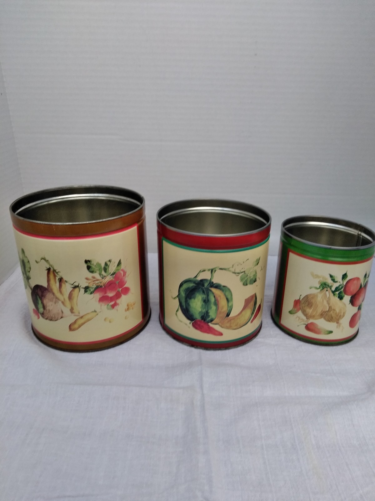 vintage canister set vegetable pattern