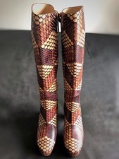 gucci combat boots with snake on bottom