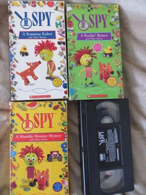 5 I SPY books early reader +4 VHS video tapes Runaway robot, Mumble Mystery game