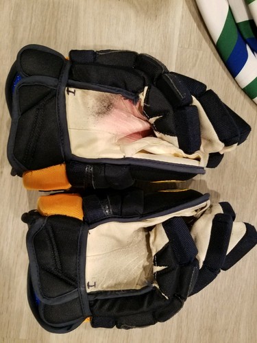 Buffalo Sabres Game Worn Used Hockey Gloves - Marco Scandella Warrior Pro Stock