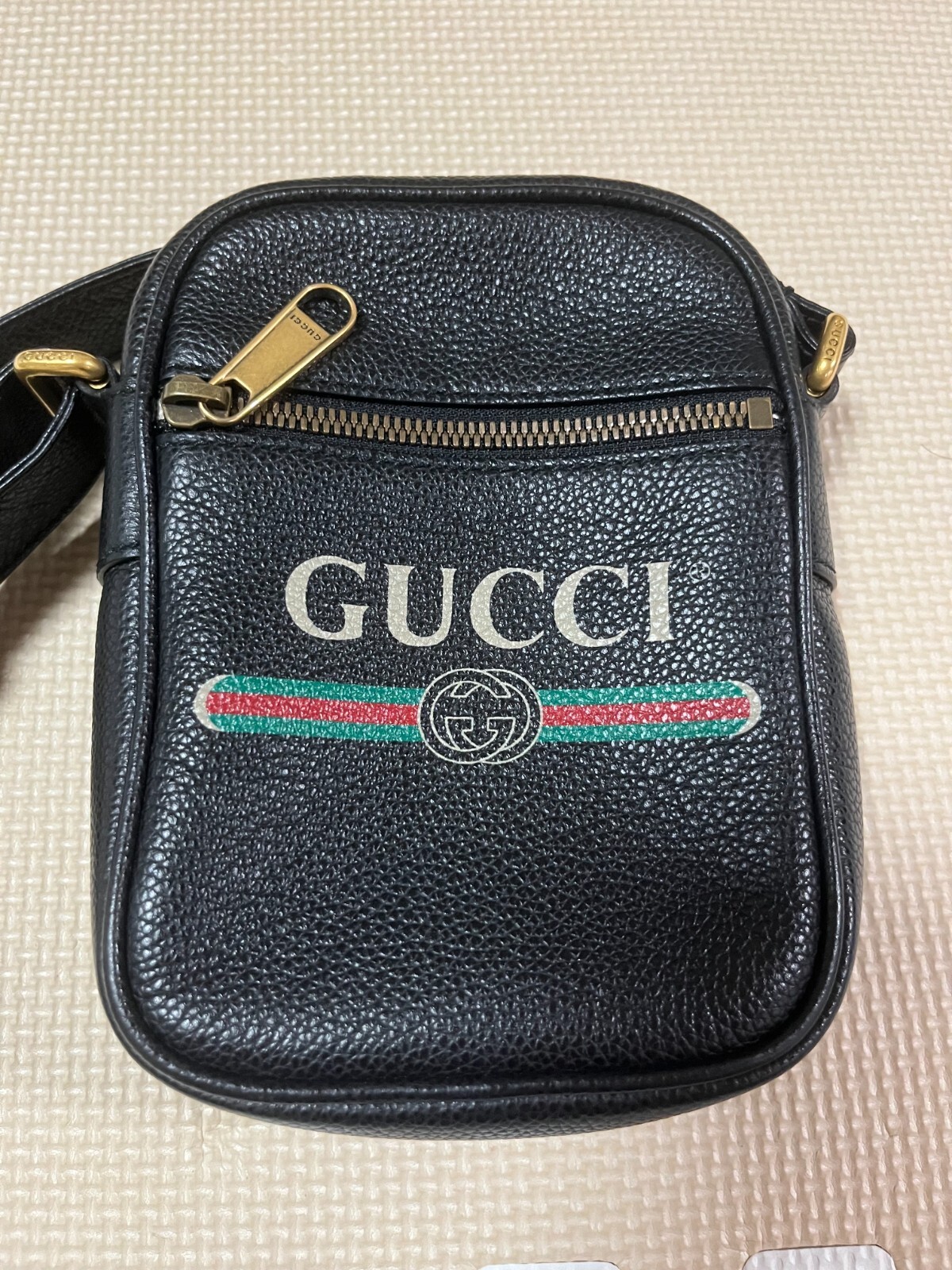GUCCI Vintage Logo Print Shoulder Bag Black Zip Women from GUCCI Vintage Logo Print Shoulder Bag Black Zip Women from