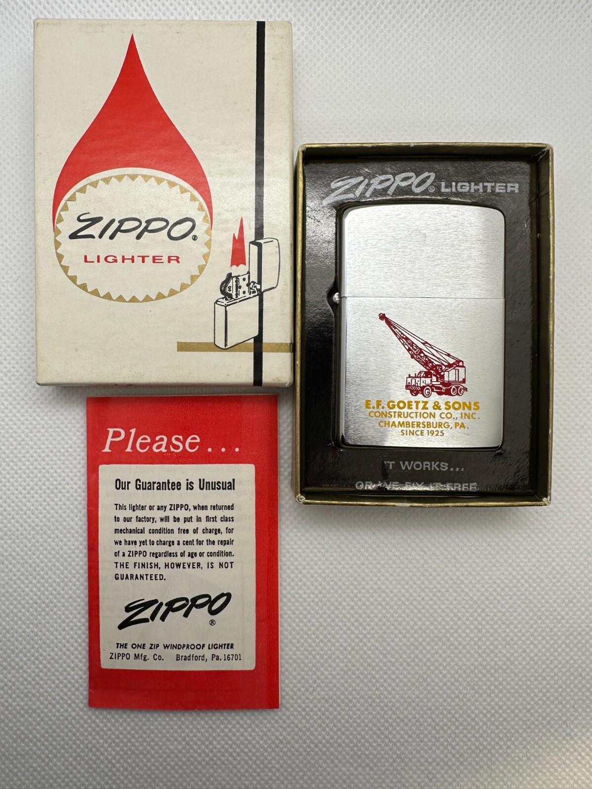 Vintage 1962 Full Size Zippo Lighter. E.F. Goetz Const. Color Graphics