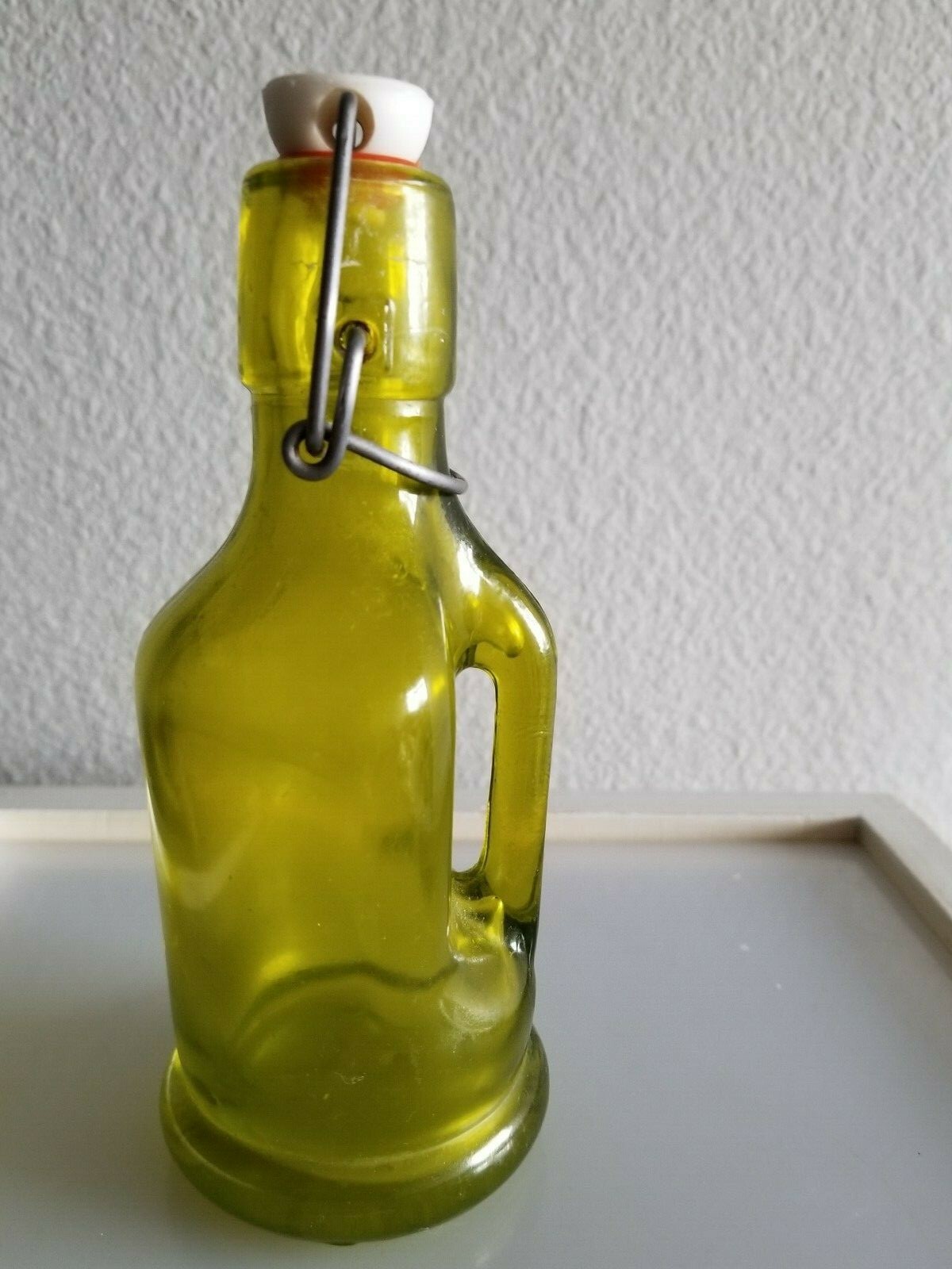 Antique Green Bottle with Handle & Ceramic Top 6 1/2