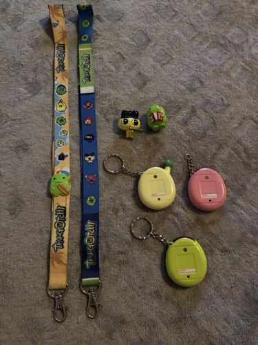 Tamagotchi Lot Of 3 With Lanyards And Charms