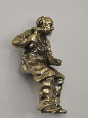 ​English Miniatures Victorian ​​Seated Blacksmith Miniature Figurine with Hammer